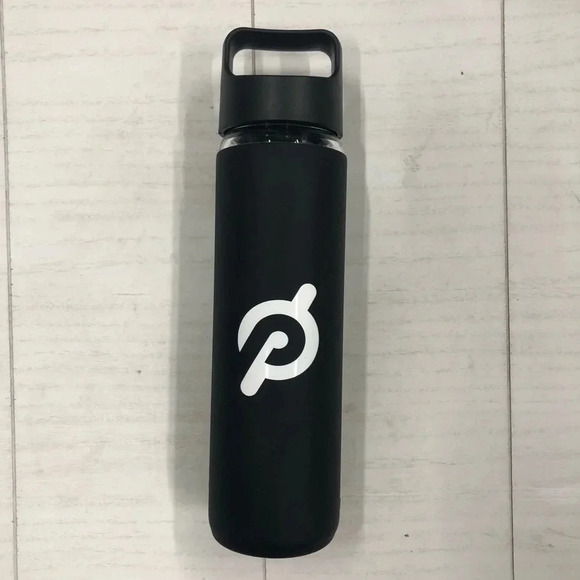 Peloton Glass Water Bottle with Black padded material around‎ glass with logo. - Picture 1 of 5